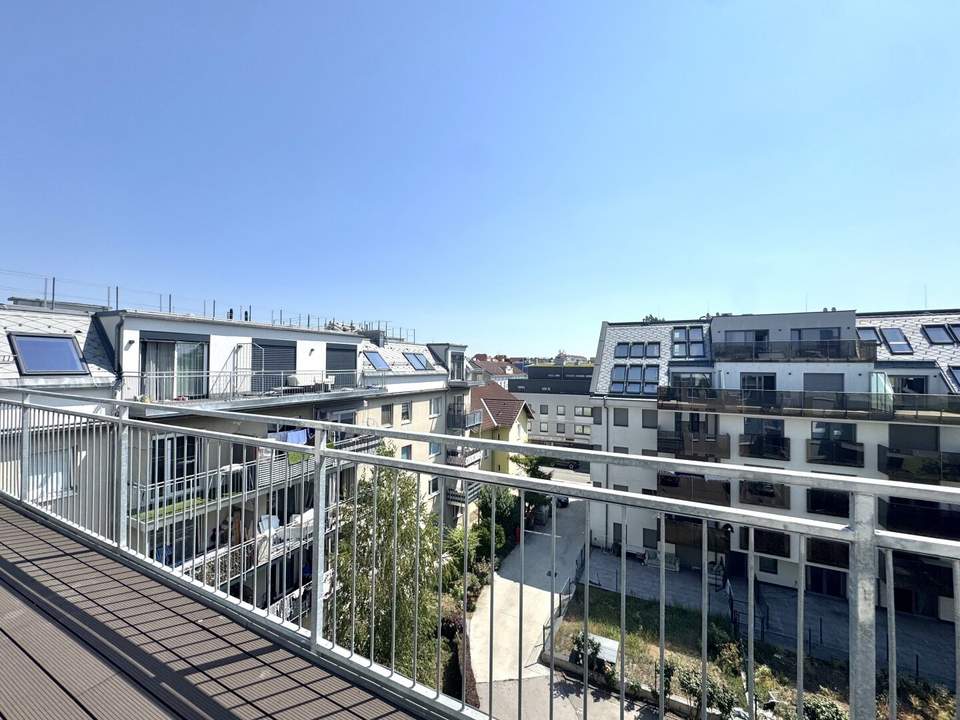 Großzügige Dachgeschosswohnung mit sonnigem Balkon - Klimaanlage - Erstbezug