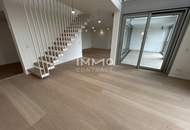 Exklusive Penthouse Wohnung auf 2 Etagen mit atemberaubenden Ausblick auf die Donau und die Innenstadt!
