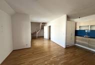 Helle 3-Zimmer Neubau Maisonette-Wohnung mit 2 Terassen, Wohnküche, Gartennutzung, Kellerabteil und Garagenplatz optional