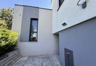 Exklusives Doppelhaushälfte mit sonniger Terrasse, Doppelgarage und Eigengarten!
