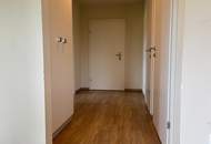 Erdgeschoßwohnung mit eigenem Gartenanteil in zentraler Lage