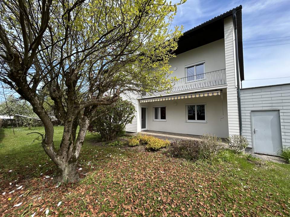 Großzügige Familienwohnung mit Garten und Garage