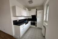 1-Zimmer-Wohnung im Zentrum mit Garten und Tiefgaragenstellplatz!