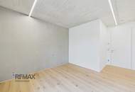 Moderne 3-Zimmer-Erstbezugswohnung mit privatem Garten, großen Fensterfronten und viel Tageslicht