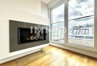 Urbaner Luxus: Maisonette mit Weitblick, Kamin und lichtdurchfluteten Räumen