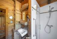 „Wohnen im Einklang mit der Natur – Stilvolles Holzhaus in traumhafter Ruhelage auf unverbaubarem Grundstück“