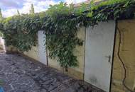 Bungalow mit Garage und großem Garten in Badener Grünruhelage!