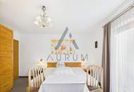 Entwicklungspotenzial: Großzügiges Grundstück mit Bestandsgebäude - Ferienpension