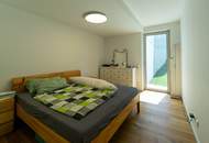 Design trifft Natur: stylische Garten-Maisonettewohnung mit traumhafter Aussicht