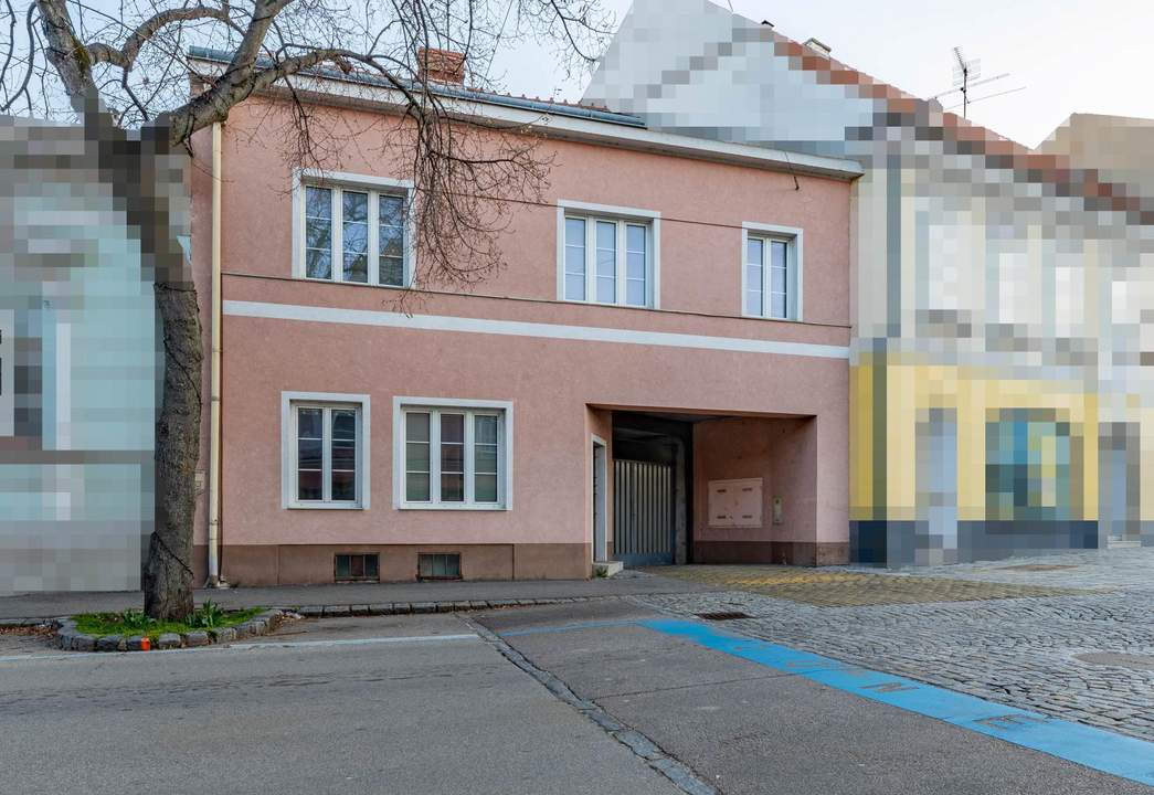 DAS INVESTMENT IN BESTLAGE! Wohnung sowie Geschäftslokal, Praxis oder Büro- 2 Garagen im Innenhof