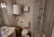 Vielseitige Immobilie mit Pizzeria und Wohnmöglichkeiten