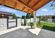 High-end living in a peaceful green location! A feel-good retreat in a class of its own: tradition meets state-of-the-art comfort!