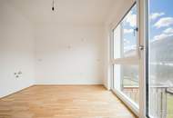 WOHNEN WO ANDERE URLAUB MACHEN! 2-ZIMMER-WOHNUNG MIT GROSSEM GARTEN UND PKW-STELLPLATZ! ERSTBEZUG!