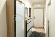 Familienwohnung mit 4 Zimmern im Zentrum mit großer Terrasse / eigene Garage - generalsaniert!