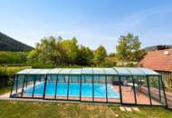 Entspannte Stunden auf der sonnigen Terrasse oder im beheizbaren Pool mit Blick auf den Gfieder!