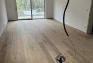 Modernes Zweifamilienhaus mit Gartenwohnungen – Erstbezug!