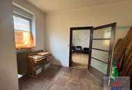 Haushälfte mit einer Wohnung für geschickte Heimwerker und einen schönen Garten in Langenzersdorf!