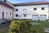 Wohnhaus mit 2 Einheiten, großer 2-stöckiger Garage und gemütlichem Garten