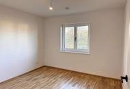 Exklusive Erdgeschosswohnung mit großzügigem Garten in Stadtnähe