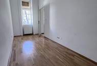 Lichtdurchflutete 2-Zimmerwohnung im prachtvollen Altbauhaus am Tivoli