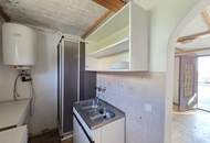 Älteres Kleinwohnhaus mit Potenzial samt Südbalkon mit Aussicht