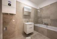 Sanierter Altbau mit modernem Neubau