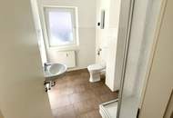 Herrlich sanierte Erdgeschosswohnung mit moderner Wohnküche, stilvollem Badezimmer und Grünblick - in ruhiger Siedlungslage mit ausgezeichneter Infrastruktur, ideal für kleine Familien!