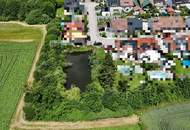 Sonniges Freizeitgrundstück mit idyllischem Teich in begehrter Lage von Wels-Puchberg