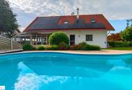 Luxusvilla mit großzügigem Garten, Pool und 3 Garagen in idyllischer Lage!