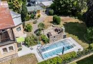 Einfamilienhaus mit Salzwasserpool, Wintergarten, Garage und zwei Carports