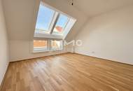 BEIM DONAUUFER: Klimatisierte 3-Zimmer-Dachgeschosswohnung mit sonnigem Glasbalkon