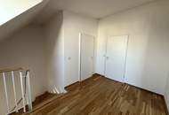 Helle 3-Zimmer Neubau Maisonette-Wohnung mit 2 Terassen, Wohnküche, Gartennutzung, Kellerabteil und Garagenplatz optional