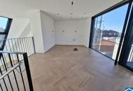 Spektakuläre Dachgeschoßmaisonette mit Terrassentraum und Blick auf die Canisiuskirche