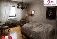 Außergewöhnliches Einfamilienhaus mit Geschichte, großzügigem Raumangebot, besonderem Charakter und parkähnlichem Garten.