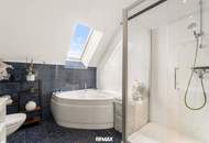 Wohnen über den Dächern von Graz mit Blick auf den Schlossberg: Exklusive Stadtwohnung mit Terrasse