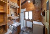 „Wohnen im Einklang mit der Natur – Stilvolles Holzhaus in traumhafter Ruhelage auf unverbaubarem Grundstück“