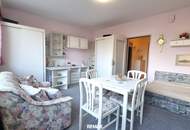 Lichtdurchflutete 1-Zimmer Wohnung mit exklusiver Poolanlage in begehrter Lage