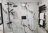 Design trifft Lebensqualität – Exklusive Neubauwohnung mit Seeblick