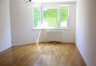 "Familienwohnung mit Schwimmbiotop und Garage!"