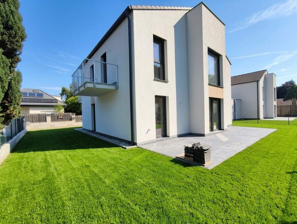 Exklusives 5-Zimmer-Einfamilienhaus mit Garage - Schlüsselfertig - Großzügige Wohnflächen trifft auf idyllischen Eigengarten - Wohnkomfort auf höchstem Niveau