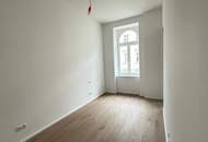 Sanierter Altbau mit Erker: Charmante 2-Zimmer-Wohnung mit separater Küche