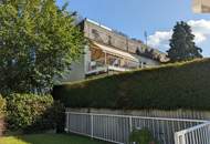 4-Zimmer-Terrassenwohnung mit ca.100m² Garten und TG Stellplatz