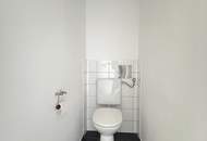 Vermietete Anlegerwohnung mit Balkon und moderner Küche in zentraler Lage