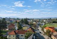 "Am Fuße des Bisambergs: großes Grundstück mit Bungalow und XXL-Garage"