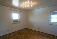Bezaubernde 3 Zimmerwohnung mit Balkon, Garten und 2 Parkplätzen