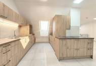 Traumhafte Dachgeschosswohnung – Erstbezug in hochwertig gebautem Wohnhaus - Klimaanlage - Moderne Küche - Gemeinschaftsgarten