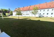 Herrlich sanierte Erdgeschosswohnung mit moderner Wohnküche, stilvollem Badezimmer und Grünblick - in ruhiger Siedlungslage mit ausgezeichneter Infrastruktur, ideal für kleine Familien!