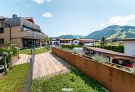 Modernes Wohnen mit Bergblick &amp; Sonnenterrasse – Hochwertige 2-Zimmer Gartenwohnung in Kössen