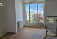 Exklusive Dachgeschosswohnung mit 360° Blick über die Dächer