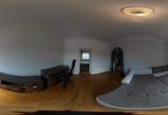 Mehrparteienhaus mit zwei Geschäftslokalen